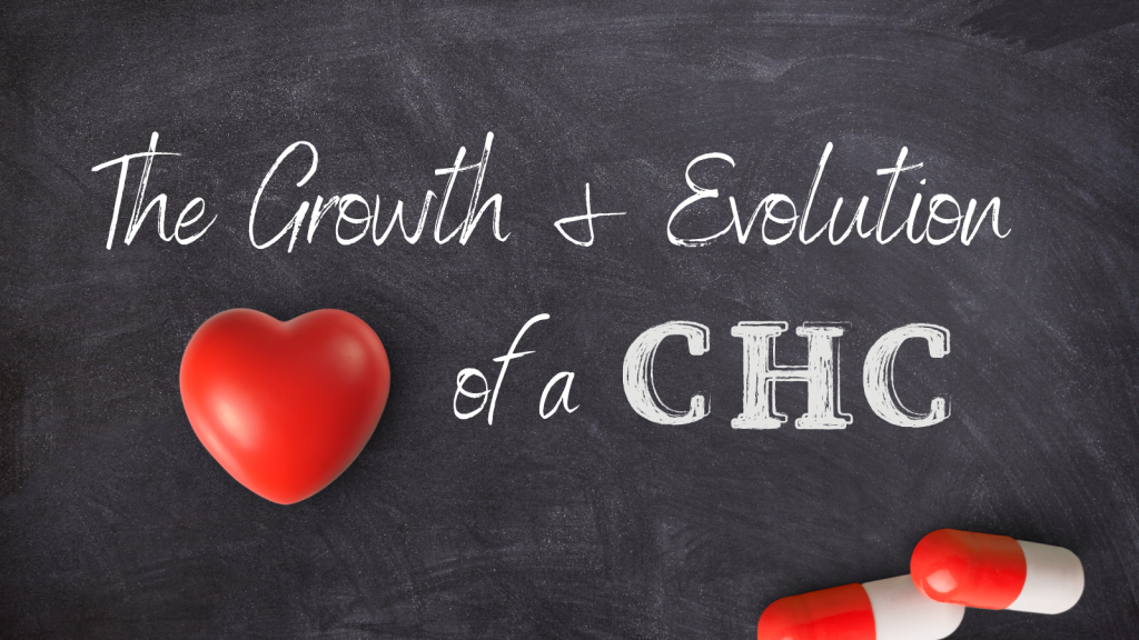 chalkboard with the writing "The Growth and Evolution of a CHC" with a red heart next to the text and pills off to the side