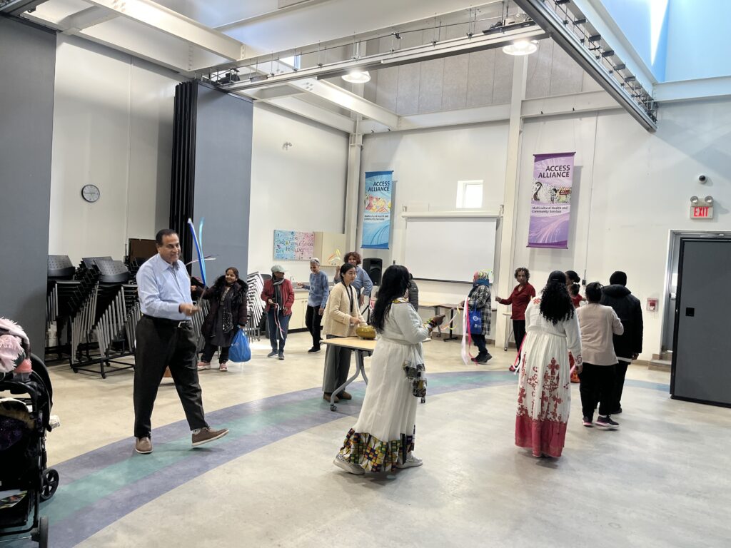 Participants engaged in a movement exercise together